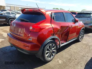 2014 Nissan Juke S with VIN JN8AF5MR0ET451948, listed as a IAAI auction lot 42035893 with 123,698 mi miles and . Bid and sale history available at carsss.com. Image 4.