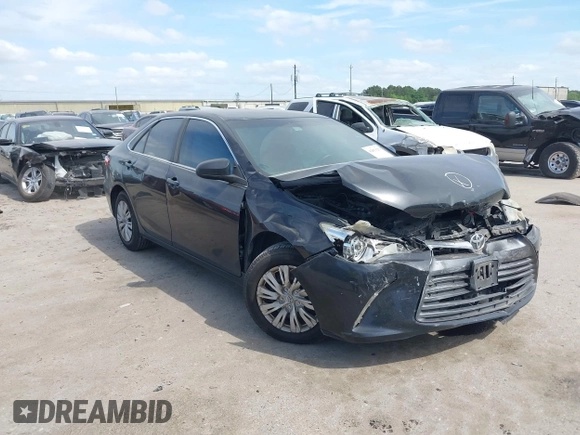 2015 Toyota Camry XLE with VIN 4T1BF1FK7FU037419, listed as a IAAI auction lot 42053259 with 118,453 mi miles and . Bid and sale history available at DreamBid. Image 1.
