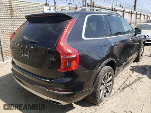 2016 Volvo XC90 T6 Momentum with VIN YV4A22PKXG1090325, listed as a Copart auction lot 56615962 with Not Provided miles. Bid and sale history available at carsss.com. Image 4.