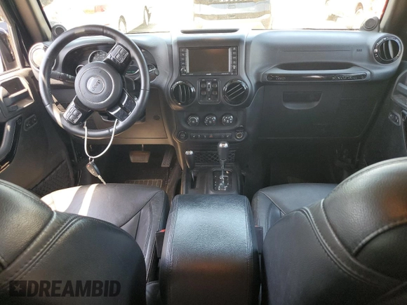 2014 Jeep Wrangler Unlimited Sahara with VIN 1C4HJWEG5EL312006, listed as a Copart auction lot 61821445 with 159,416 mi miles and Salvage title. Bid and sale history available at DreamBid. Image 8.