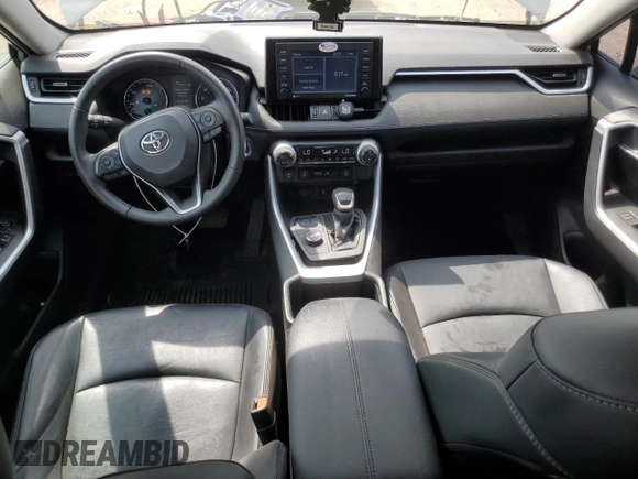 2022 Toyota RAV4 Hybrid XLE Premium with VIN 4T3B6RFV8NU101319, listed as a Copart auction lot 60987535 with 100,070 mi miles and Salvage title. Bid and sale history available at DreamBid. Image 8.