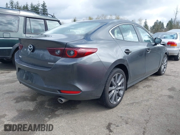 2025 Mazda 3 S Preferred with VIN 3MZBPACM8SM457113, listed as a IAAI auction lot 41938950 with 4,291 mi miles and . Bid and sale history available at DreamBid. Image 4.