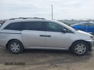 2013 Honda Odyssey LX with VIN 5FNRL5H22DB086503, listed as a IAAI auction lot 42133471 with 223,200 mi miles and . Bid and sale history available at carsss.com. Image 14.