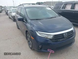 2022 Honda Odyssey Elite z VIN 5FNRL6H90NB025946, wystawiony jako IAAI lot #42300705 z przebiegiem 61 989 mil mil oraz . Historia ofert i sprzedaży dostępna na DreamBid. Obrazek 1.