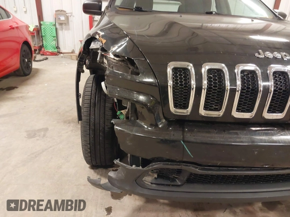 2016 Jeep Cherokee Sport with VIN 1C4PJMAB0GW321370, listed as a IAAI auction lot 41487094 with 131,336 mi miles and . Bid and sale history available at DreamBid. Image 6.