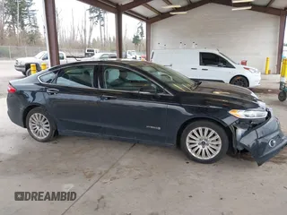 2016 Ford Fusion SE Hybrid with VIN 3FA6P0LU1GR106980, listed as a IAAI auction lot 41895379 with 200,226 mi miles. Bid and sale history available at carsss.com. Image 12.