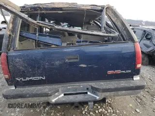 1996 GMC Yukon with VIN 1GKEK13R2TJ718801, listed as a Copart auction lot 84489744 with 0 mi miles and Salvage Title. Bid and sale history available at carsss.com. Image 6.