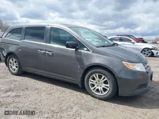 2013 Honda Odyssey EX with VIN 5FNRL5H40DB068597, listed as a IAAI auction lot 41910524 with 164,991 mi miles. Bid and sale history available at carsss.com. Image 1.