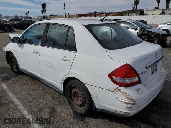 2008 Nissan Versa 1.8 S with VIN 3N1BC11E58L371074, listed as a Copart auction lot 46701965 with 49,467 mi miles and Salvage Title. Bid and sale history available at carsss.com. Image 2.
