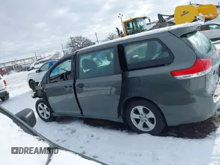 2014 Toyota Sienna L with VIN 5TDZK3DC2ES429684, listed as a IAAI auction lot 41529309 with 112,190 mi miles. Bid and sale history available at carsss.com. Image 14.
