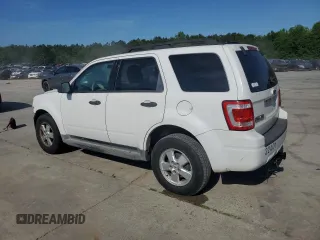 2009 Ford Escape XLS with VIN 1FMCU02719KB53740, listed as a Copart auction lot 55210035 with 144,672 mi miles and Salvage title. Bid and sale history available at DreamBid. Image 2.