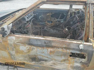 1986 Toyota MR2 z VIN JT2AW15CXG0066425, wystawiony jako Copart lot #74560234 z przebiegiem Nie podano mil oraz Nie do naprawy. Historia ofert i sprzedaży dostępna na DreamBid. Obrazek 7.