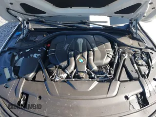 2017 BMW 7 Series 750i with VIN WBA7F0C34HGM21738, listed as a IAAI auction lot 41772933 with 62,923 mi miles and . Bid and sale history available at carsss.com. Image 10.