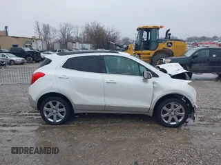 2016 Buick Encore Leather with VIN KL4CJGSB2GB724332, listed as a IAAI auction lot 41547091 with 61,096 mi miles. Bid and sale history available at carsss.com. Image 14.