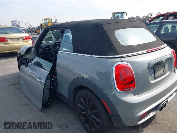 2017 MINI Convertible Cooper S z VIN WMWWG9C36H3C81439, wystawiony jako IAAI lot #41480915 z przebiegiem 64 104 mil mil oraz . Historia ofert i sprzedaży dostępna na DreamBid. Obrazek 15.