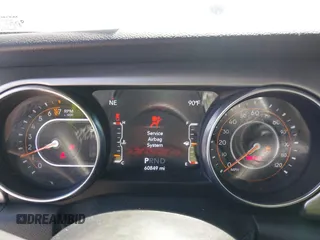 2021 Jeep Gladiator Freedom с VIN 1C6HJTAG2ML512027, выставлен на аукционе IAAI как лот 42333415 с пробегом 60 849 миль миль и . История ставок и продаж доступна на DreamBid. Изображение 7.