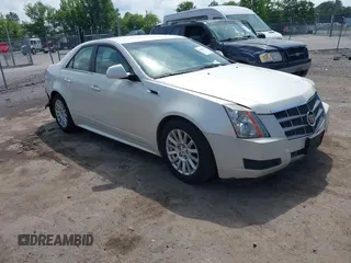 2011 Cadillac CTS Luxury z VIN 1G6DE5EY4B0147099, wystawiony jako IAAI lot #42405115 z przebiegiem 134 800 mil mil oraz . Historia ofert i sprzedaży dostępna na DreamBid. Obrazek 1.