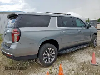 2023 Chevrolet Suburban LT with VIN 1GNSCCKD5PR308814, listed as a Copart auction lot 61955315 with 33,659 mi miles and Salvage title. Bid and sale history available at DreamBid. Image 3.
