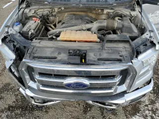 2015 Ford F-150 XLT with VIN 1FTEW1EG1FFA90068, listed as a Copart auction lot 84421594 with 150,386 mi miles and Salvage title. Bid and sale history available at DreamBid. Image 11.