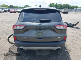 2020 Ford Escape Titanium with VIN 1FMCU9J94LUB19570, listed as a IAAI auction lot 42134031 with 110,248 mi miles and . Bid and sale history available at DreamBid. Image 16.