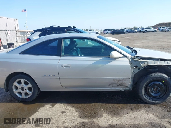 2001 Toyota Solara SE z VIN 2T1CF28P91C491927, wystawiony jako IAAI lot #42475651 z przebiegiem 142 628 mil mil oraz . Historia ofert i sprzedaży dostępna na DreamBid. Obrazek 14.