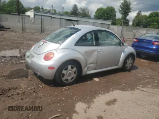 2001 Volkswagen Beetle GLX with VIN 3VWDD21C21M406898, listed as a Copart auction lot 55597675 with 104,597 mi miles and Salvage Title. Bid and sale history available at DreamBid. Image 3.