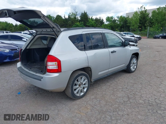 2007 Jeep Compass Sport with VIN 1J8FF47W97D279230, listed as a IAAI auction lot 42207379 with 205,058 mi miles and . Bid and sale history available at carsss.com. Image 4.