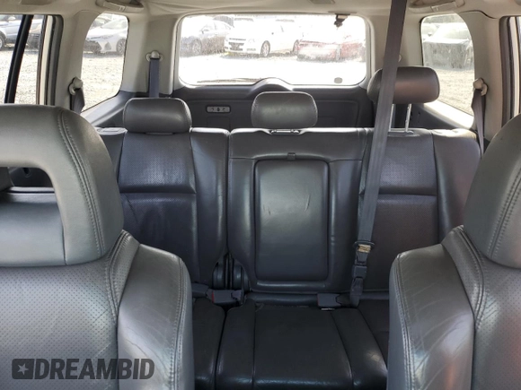 2005 Honda Pilot EX-L with VIN 2HKYF18505H500452, listed as a Copart auction lot 57552535 with 282,733 mi miles and Salvage title. Bid and sale history available at DreamBid. Image 10.