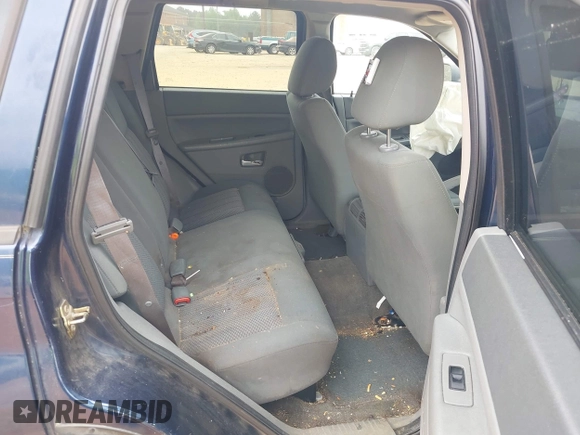 2005 Jeep Grand Cherokee Laredo with VIN 1J4GS48K45C510826, listed as a IAAI auction lot 42100641 with 250,717 mi miles and . Bid and sale history available at DreamBid. Image 8.
