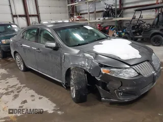 2011 Lincoln MKS EcoBoost with VIN 1LNHL9FT3BG610092, listed as a IAAI auction lot 41579518 with 101,614 mi miles and . Bid and sale history available at DreamBid. Image 1.
