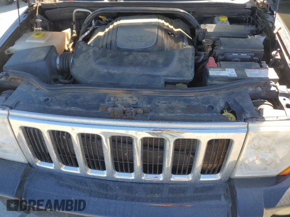 2010 Jeep Commander Limited z VIN 1J4RG5GT0AC153228, wystawiony jako Copart lot #75686884 z przebiegiem 178 715 mil mil oraz Szkoda całkowita • Salvage title. Historia ofert i sprzedaży dostępna na DreamBid. Obrazek 13.