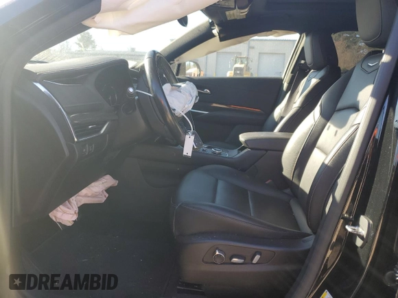 2019 Cadillac XT4 AWD Sport with VIN 1GYFZFR48KF100558, listed as a Copart auction lot 80749134 with 61,389 mi miles and Salvage title. Bid and sale history available at DreamBid. Image 7.