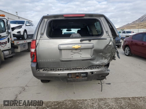 2012 Chevrolet Suburban LS with VIN 1GNWKLEG3CR308413, listed as a Copart auction lot 83671324 with 141,053 mi miles and Salvage title. Bid and sale history available at DreamBid. Image 6.