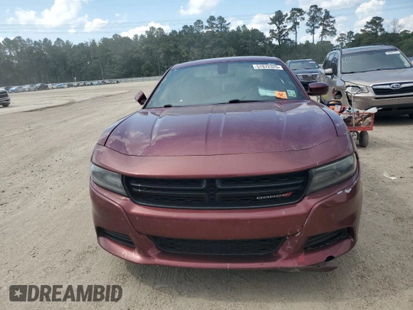 2019 Dodge Charger SXT with VIN 2C3CDXBG4KH721185, listed as a Copart auction lot 57872325 with 123,429 mi miles and Salvage title. Bid and sale history available at DreamBid. Image 5.