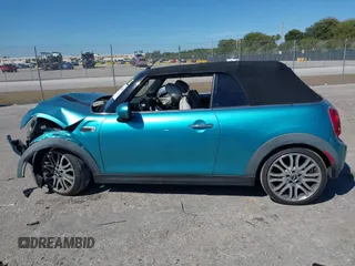 2016 MINI Convertible z VIN WMWWG5C5XG3A83276, wystawiony jako IAAI lot #41864830 z przebiegiem 103 721 mil mil oraz . Historia ofert i sprzedaży dostępna na DreamBid. Obrazek 14.