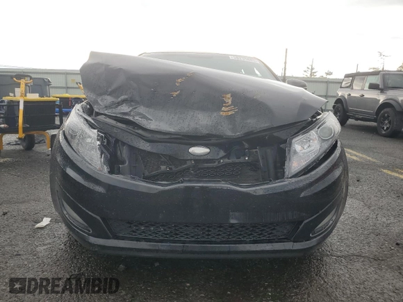 2013 Kia Optima LX z VIN 5XXGM4A72DG175781, wystawiony jako Copart lot #58235885 z przebiegiem 180 949 mil mil oraz Szkody całkowita. Historia ofert i sprzedaży dostępna na DreamBid. Obrazek 5.