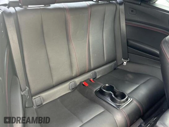 2016 BMW 2 Series 228i with VIN WBA1K9C53GV711048, listed as a Copart auction lot 81537084 with 38,715 mi miles and Salvage Title. Bid and sale history available at carsss.com. Image 6.