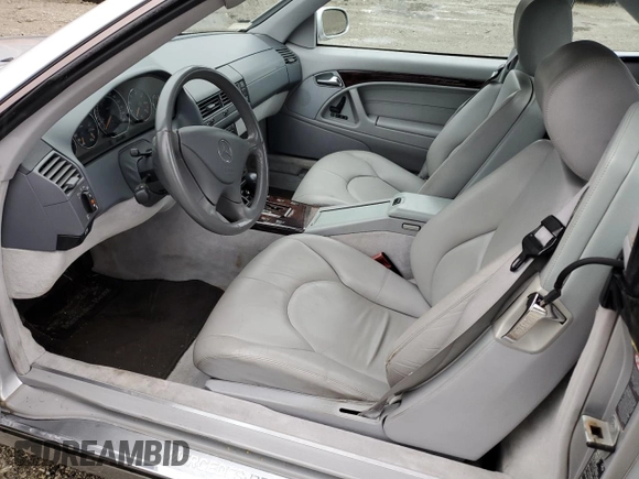 2001 Mercedes-Benz SL 500 with VIN WDBFA68F01F198112, listed as a Copart auction lot 77034114 with 114,049 mi miles and Salvage title. Bid and sale history available at DreamBid. Image 7.