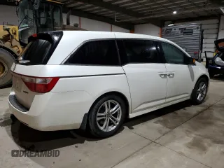 2012 Honda Odyssey Touring with VIN 5FNRL5H94CB508363, listed as a Copart auction lot 42777305 with 158,040 mi miles and Salvage Title. Bid and sale history available at DreamBid. Image 3.