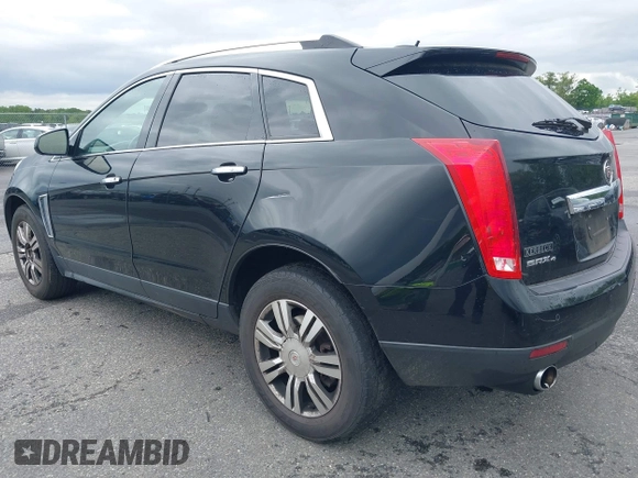 2015 Cadillac SRX Luxury Collection z VIN 3GYFNEE34FS510360, wystawiony jako IAAI lot #42343737 z przebiegiem 149 046 mil mil oraz . Historia ofert i sprzedaży dostępna na DreamBid. Obrazek 3.