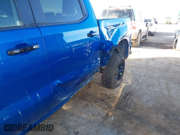 2023 Chevrolet Silverado 1500 LT Trail Boss with VIN 3GCUDFED9PG117005, listed as a IAAI auction lot 41505108 with 14,575 mi miles and . Bid and sale history available at DreamBid. Image 6.