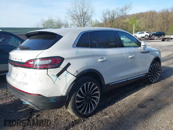 2023 Lincoln Nautilus Black Label z VIN 2LMPJ9JP1PBL28970, wystawiony jako IAAI lot #42091191 z przebiegiem 15 276 mil mil oraz . Historia ofert i sprzedaży dostępna na DreamBid. Obrazek 4.