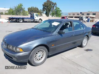 2000 BMW 5 Series 528iA with VIN WBADM634XYGU07427, listed as a IAAI auction lot 42085048 with 192,828 mi miles. Bid and sale history available at carsss.com. Image 2.