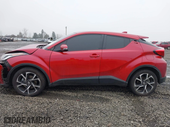 2021 Toyota C-HR LE with VIN JTNKHMBX1M1104530, listed as a IAAI auction lot 41324350 with 53,112 mi miles. Bid and sale history available at carsss.com. Image 14.