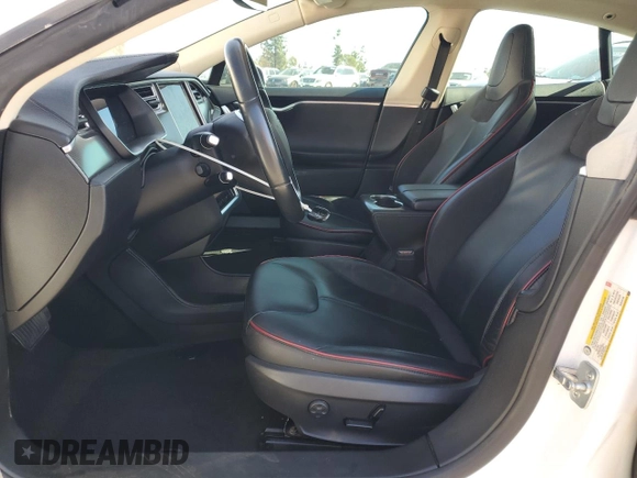 2014 Tesla Model S 60 with VIN 5YJSA1H15EFP53881, listed as a Copart auction lot 45136545 with 111,143 mi miles and Salvage Title. Bid and sale history available at DreamBid. Image 7.