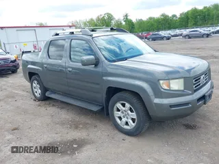 2007 Honda Ridgeline RTL z VIN 2HJYK16517H511157, wystawiony jako IAAI lot #42257637 z przebiegiem 266 894 mil mil oraz . Historia ofert i sprzedaży dostępna na DreamBid. Obrazek 1.