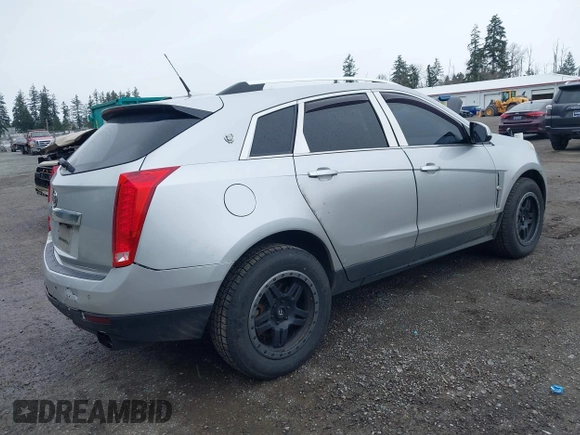 2010 Cadillac SRX Luxury Collection with VIN 3GYFNDEY7AS638025, listed as a IAAI auction lot 41913712 with 185,423 mi miles. Bid and sale history available at carsss.com. Image 4.