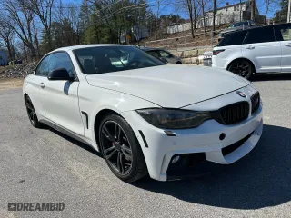 2014 BMW 4 Series 435i with VIN WBA3T3C57EP736698, listed as a Copart auction lot 52739335 with 104,403 mi miles and Clean Title. Bid and sale history available at carsss.com. Image 4.