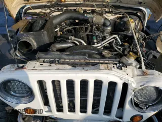 2005 Jeep Wrangler Rubicon with VIN 1J4FA69S05P306428, listed as a Copart auction lot 86441714 with 74,174 mi miles and Salvage Title. Bid and sale history available at carsss.com. Image 12.