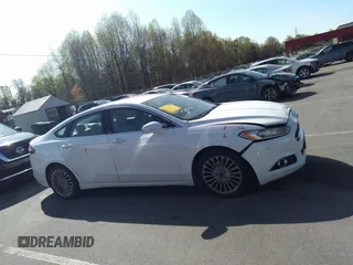 2016 Ford Fusion Titanium with VIN 3FA6P0K93GR347016, listed as a IAAI auction lot 41850780 with 215,872 mi miles and . Bid and sale history available at carsss.com. Image 13.